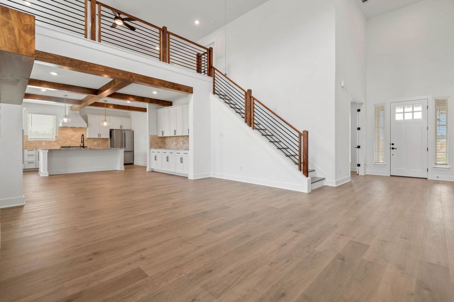 Luxury flooring is found throughout the main living areas downstairs.