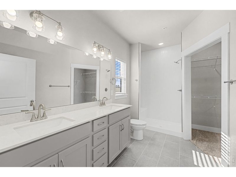 Furnished interior view inside a new home in Highlands at Fox Hill - The Flats, Longmont (Image 8).