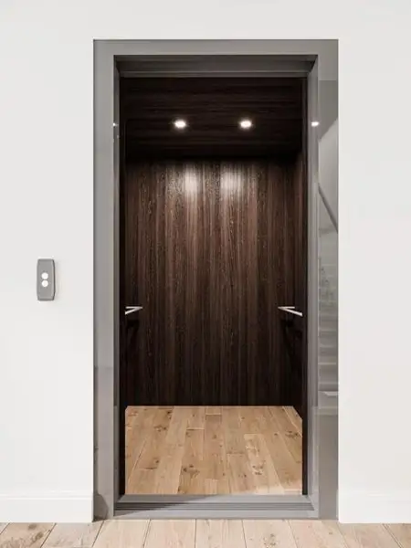 This photo shows a modern home elevator with a sleek design featuring dark wood paneling, recessed lighting, and hardwood flooring, perfect for convenient multi-level access. Virtually Staged. This photo shows a modern home elevator with a sleek design featuring dark wood paneling, recessed lighting, and hardwood flooring, perfect for convenient multi-level access. Virtually Staged.