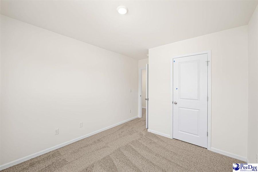 Spacious, unfurnished interior of a new home in The Grove, Florence (Image 18).