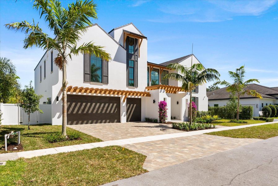 Front exterior of a new home in , Boca Raton, FL, highlighting curb appeal (Image 32). Front exterior of a new home in , Boca Raton, FL, highlighting curb appeal (Image 32).