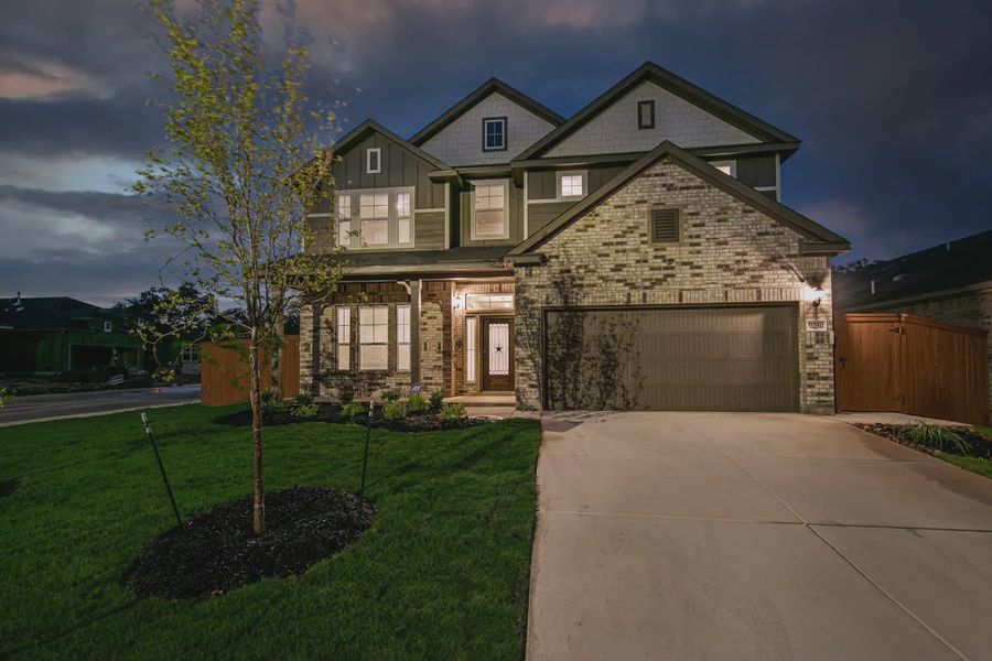 Representative exterior photo of a completed home built from the Shelby by Chesmar Homes in Buffalo Crossing, Cibolo, TX (Image 27).
