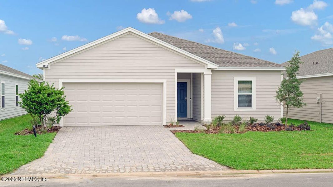 Front exterior of a new home in Coopers Meadow, Jacksonville, FL, highlighting curb appeal (Image 25).