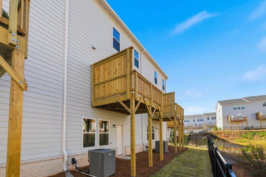 Exterior details and patio area of a home in Chandler Run, Tucker (Image 22).