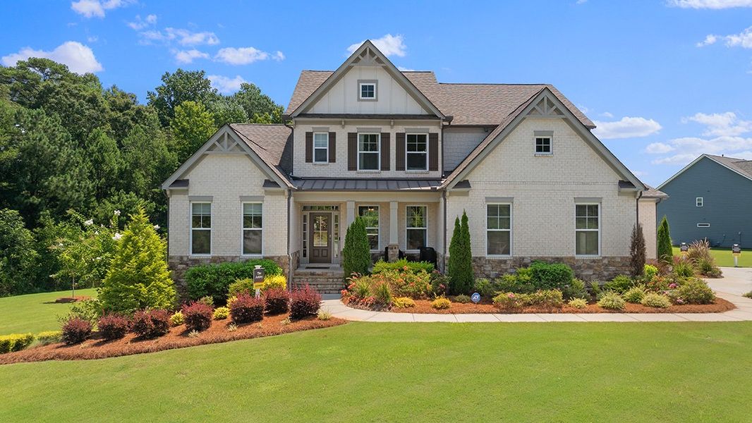 Front exterior of a new home in Genesee, Newnan, GA, highlighting curb appeal (Image 2).