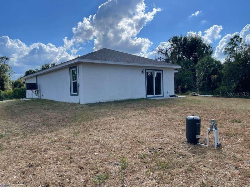 Exterior details and patio area of a home in , Port Charlotte (Image 11). Exterior details and patio area of a home in , Port Charlotte (Image 11).