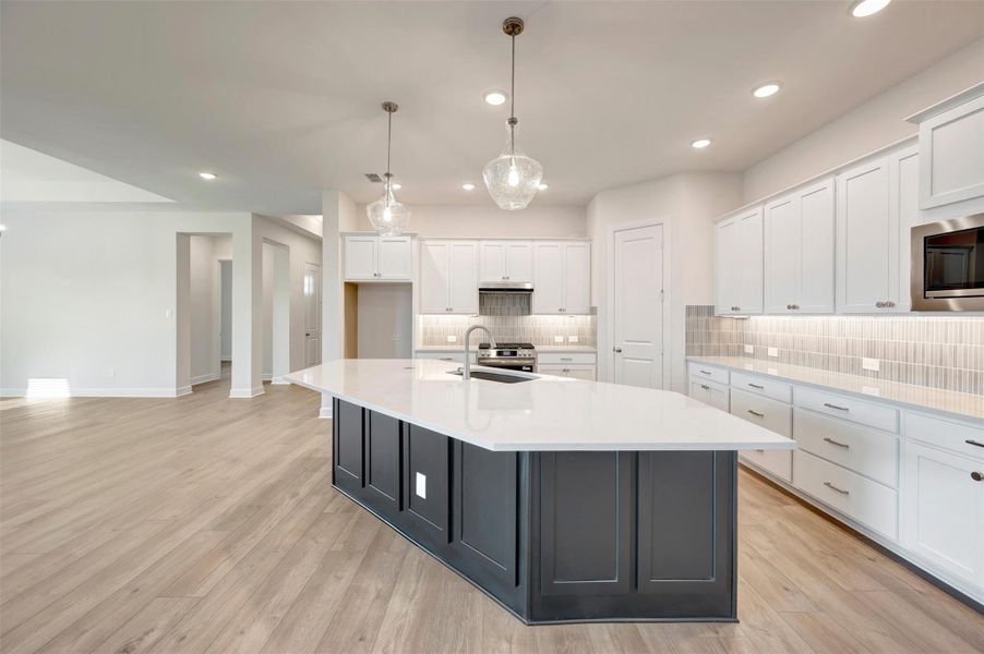 Furnished interior view inside a new home in Riceland - Enclave Row Collection, Mont Belvieu (Image 11).
