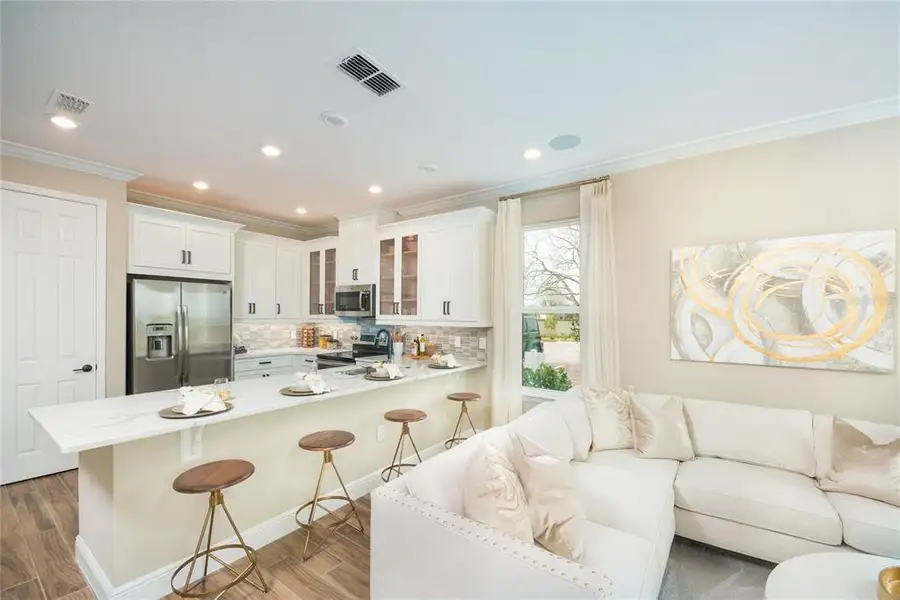 Furnished interior view inside a new home in Lochside, Mount Dora (Image 5).