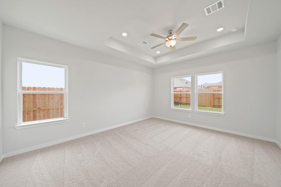 Spacious, unfurnished interior of a new home in Sunterra, Katy (Image 17).