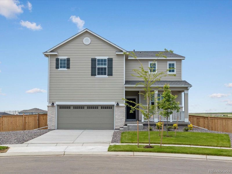 Front exterior of a new home in Buffalo Highlands: The Canyon Collection, Commerce City, CO, highlighting curb appeal (Image 26).