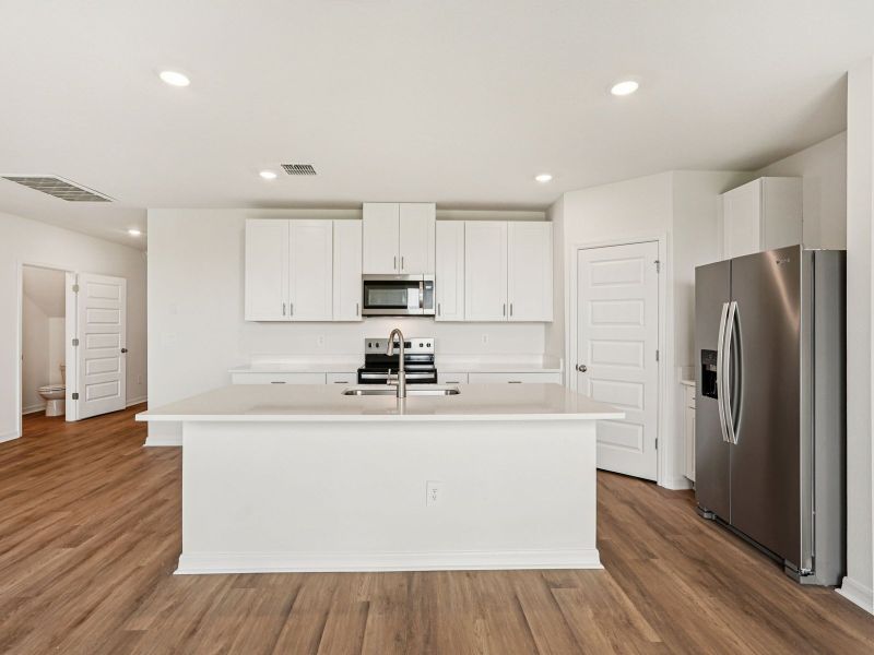 Furnished interior view inside a new home in Two Rivers - Premier Series, Zephyrhills (Image 4).