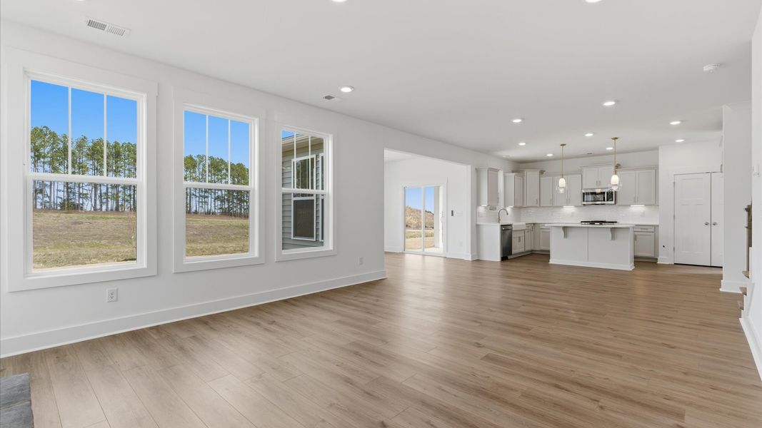 Exceptional family space with hardwood floors and seamless flow to dining and kitchen areas located in Gray Court, SC