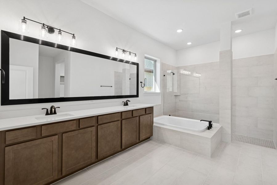 Furnished interior view inside a new home in Meridiana 55' Homesites, Manvel (Image 8).