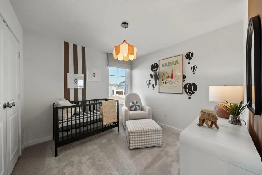 Photo of Pulte model home with same floor plan, not of actual home listed.