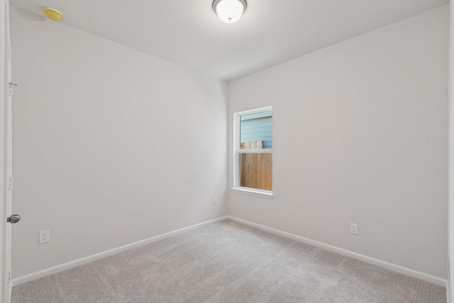 The Blue Jay II- Bedroom 2. Home under construction. Sample floor plan photo used for illustrative purposes only. Upgrades, selections options, and colors will vary. The Blue Jay II- Bedroom 2. Home under construction. Sample floor plan photo used for illustrative purposes only. Upgrades, selections options, and colors will vary.