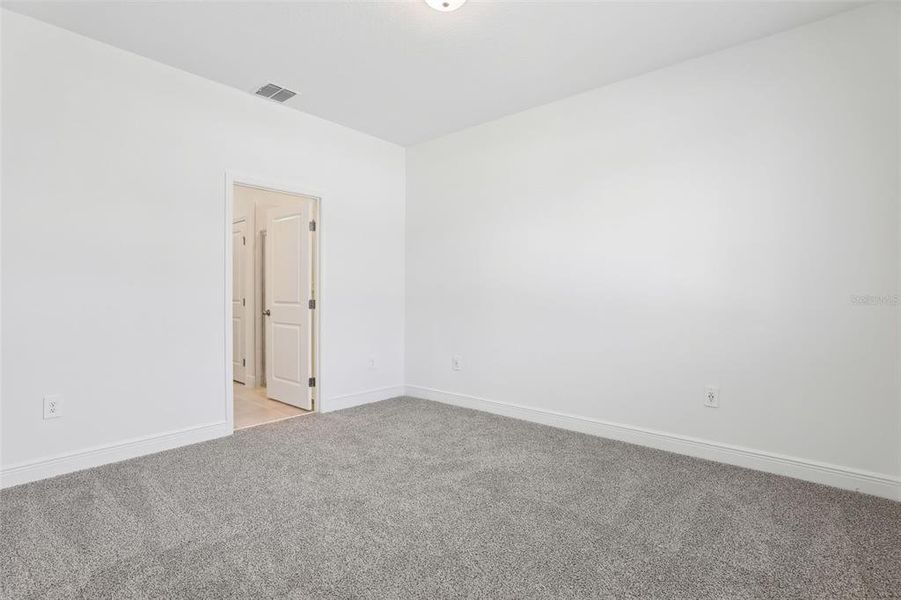 Spacious, unfurnished interior of a new home in Cyrene at Minneola - Villas, Minneola (Image 29).