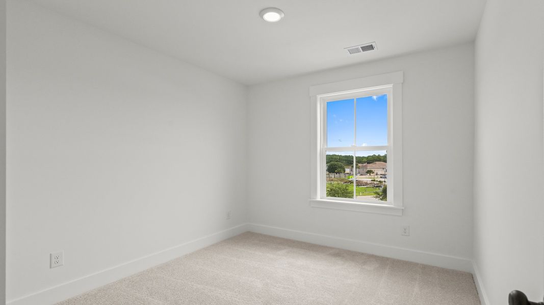 Furnished interior view inside a new home in Seabreeze Crossing, Little River (Image 14).