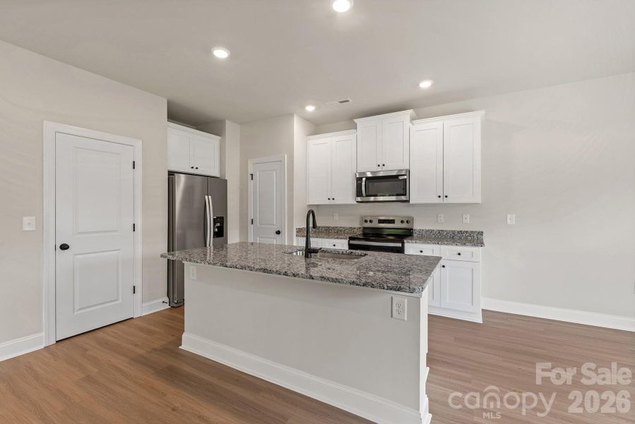 Furnished interior view inside a new home in Ascot Woods, Charlotte (Image 4).