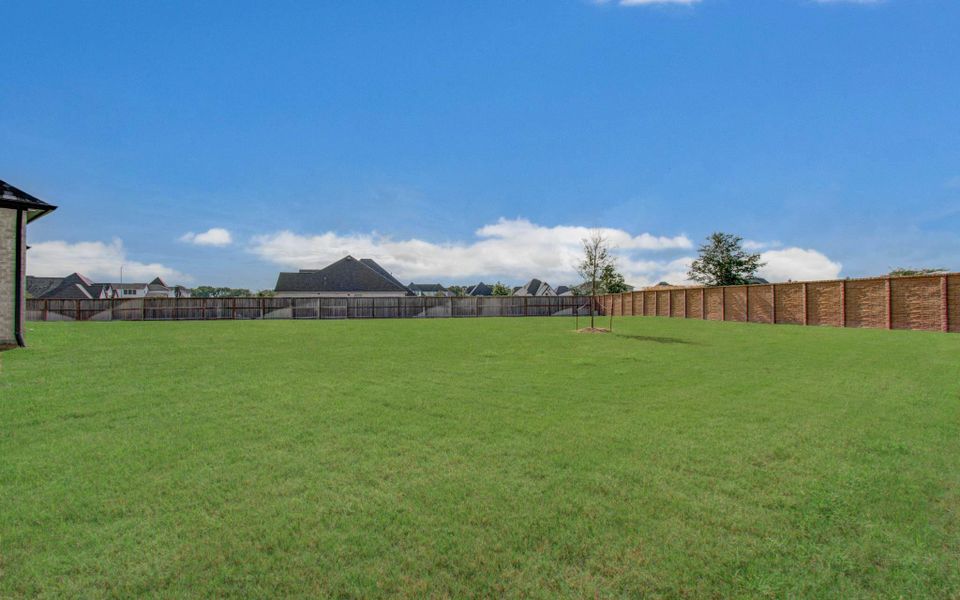 Exterior details and patio area of a home in , Manvel (Image 23).