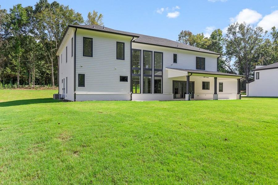 Front exterior of a new home in , Jefferson, GA, highlighting curb appeal (Image 25).