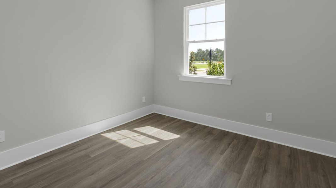 Spacious, unfurnished interior of a new home in The Cove at Indigo Preserve, Leland (Image 19).
