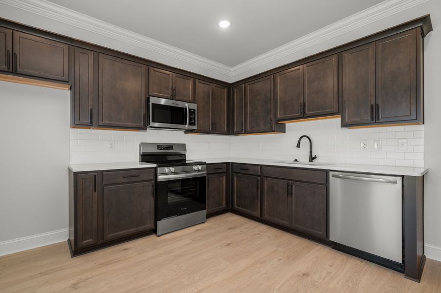 Front exterior of a new home in Saddlebrook, Murfreesboro, TN, highlighting curb appeal (Image 6).