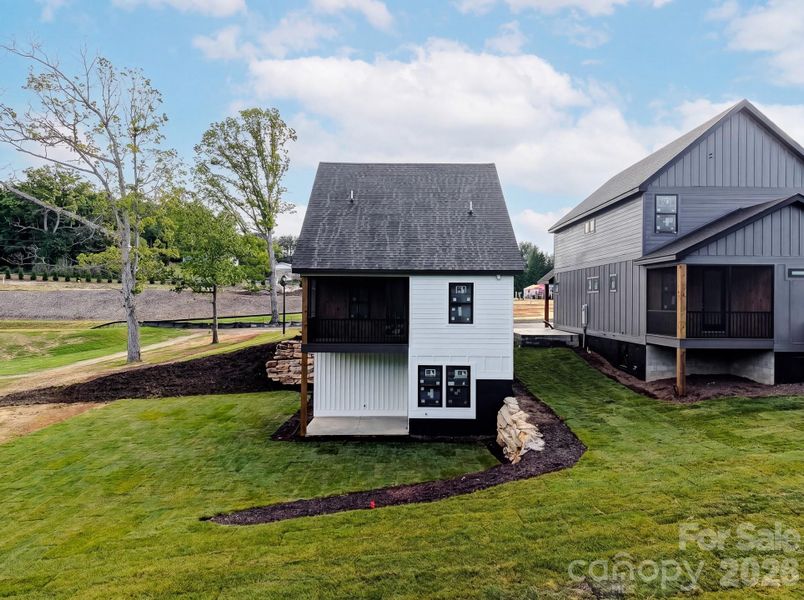 Front exterior of a new home in , Hendersonville, NC, highlighting curb appeal (Image 12). Front exterior of a new home in , Hendersonville, NC, highlighting curb appeal (Image 12).
