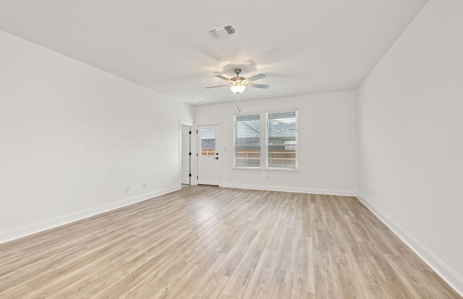 Representative unfurnished interior of a home built from the Burnet by Pulte Homes in Crosswinds, Kyle (Image 15).
