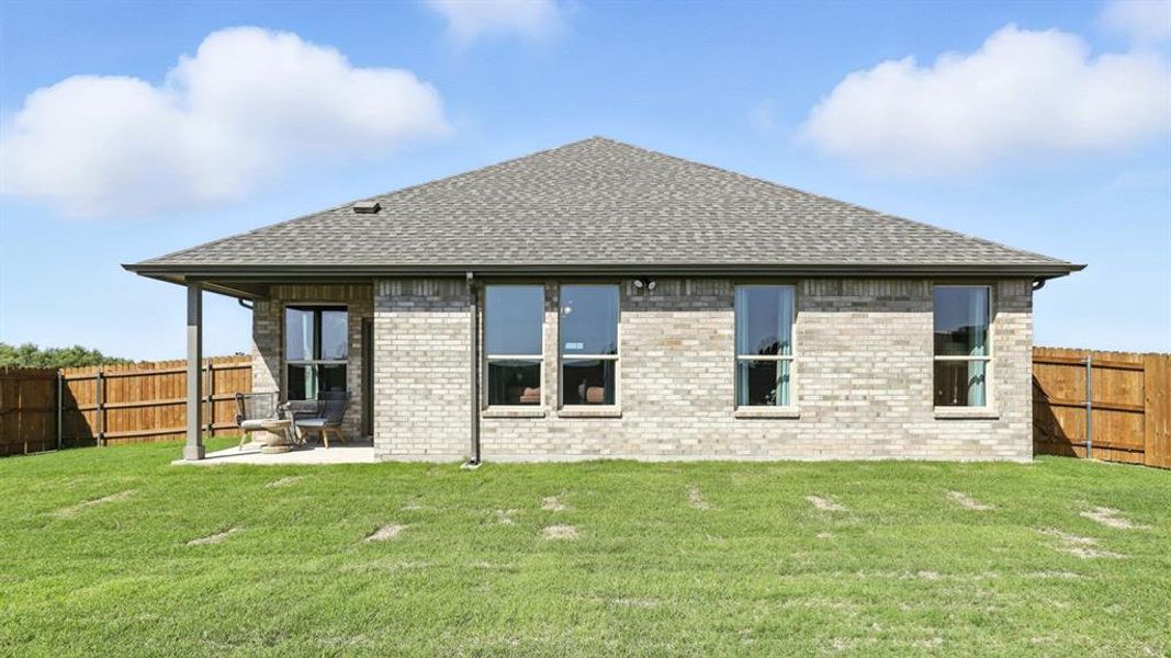 Front exterior of a new home in Legado, Cleburne, TX, highlighting curb appeal (Image 2).