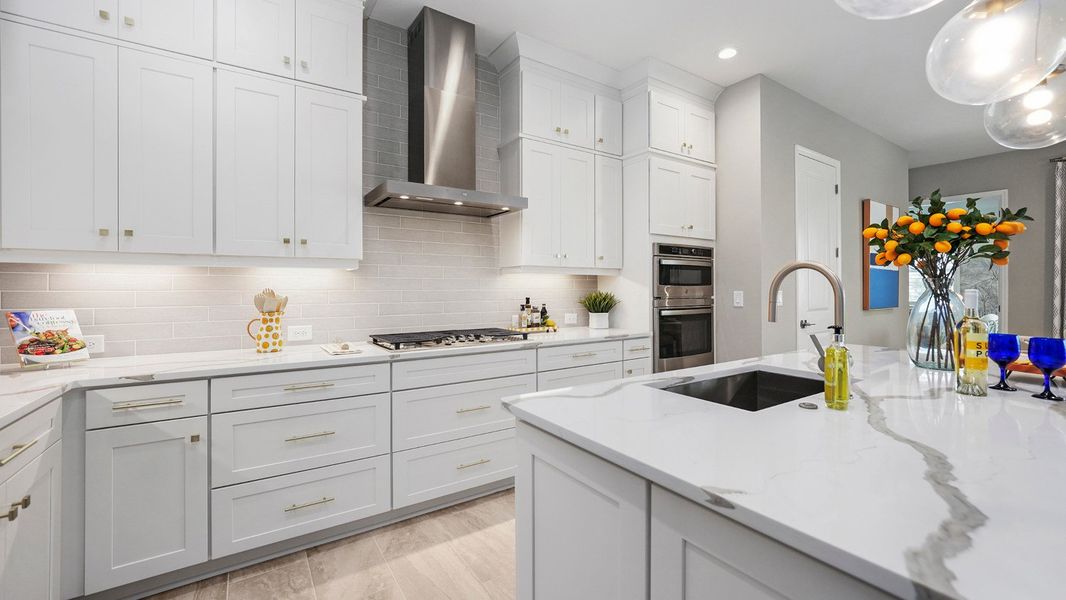 Representative furnished interior of a home built from the Captiva by Neal Communities in SkySail, Naples (Image 13).