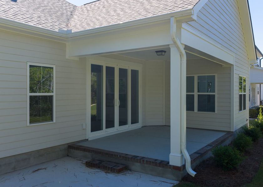 Exterior details and patio area of a home in Carolina Creek, Hampstead (Image 18). Exterior details and patio area of a home in Carolina Creek, Hampstead (Image 18).