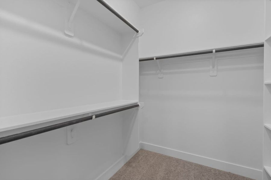 Representative unfurnished interior of a home built from the Chantilly 2 by Chesmar Homes in Meridiana Chateau, Manvel (Image 16).