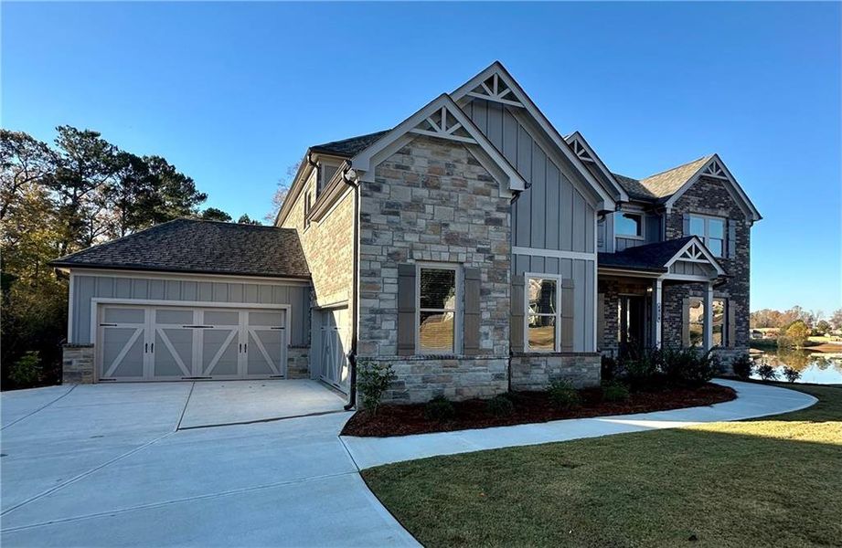 Front exterior of a new home in , Cumming, GA, highlighting curb appeal (Image 2).
