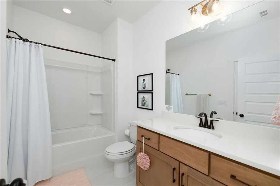 Furnished interior view inside a new home in Maddux Path, Cumming (Image 28).