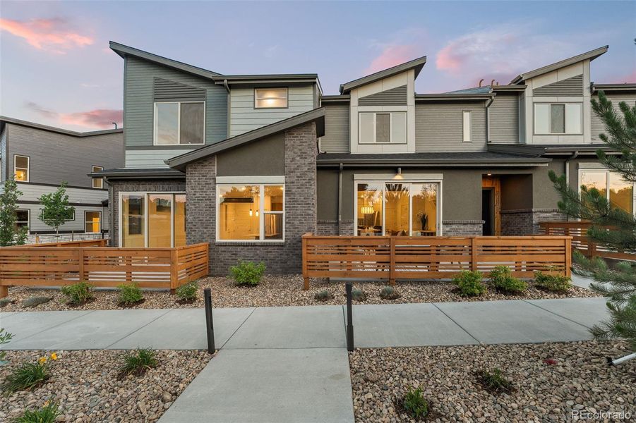 Front exterior of a new home in , Arvada, CO, highlighting curb appeal (Image 19).