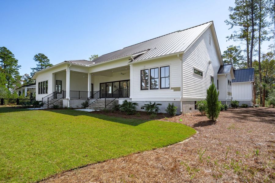 Exterior details and patio area of a home in , Ravenel (Image 2).