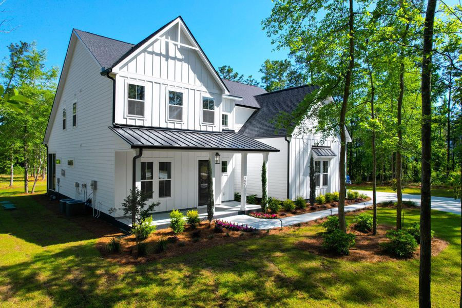 Front exterior of a new home in , Summerville, SC, highlighting curb appeal (Image 2).