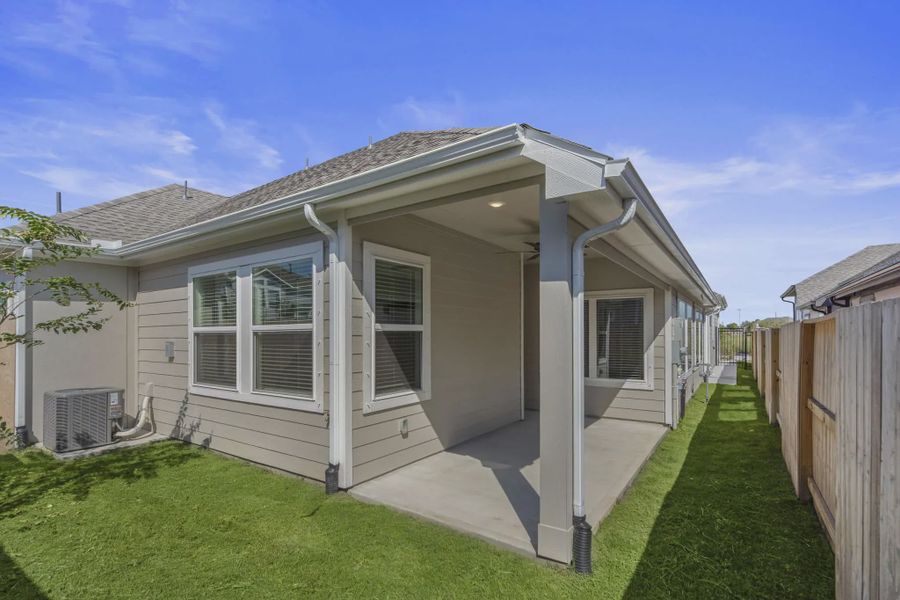 Representative exterior details of a home built from the Carriagehouse by Chesmar Homes in Meridiana Townhomes, Iowa Colony (Image 41).