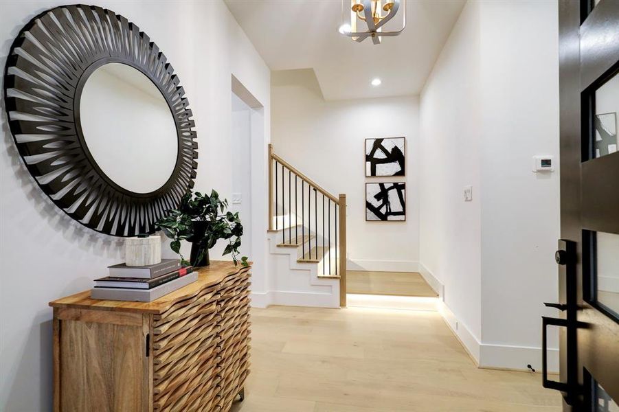 Explore the elegant entryway showcasing the smart design and tasteful finishes