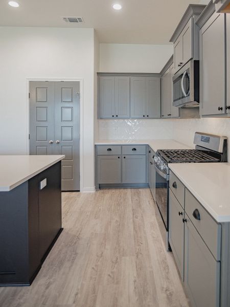 Representative furnished interior of a home built from the Salado by Steve Klein Custom Builder in TerraVista, Victoria (Image 6).