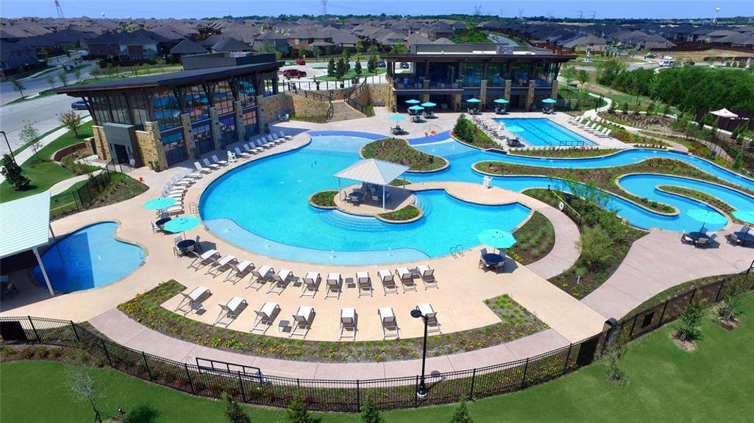 View of pool with a hot tub and a patio