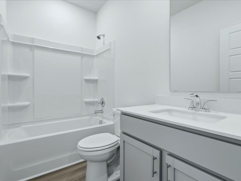 Furnished interior view inside a new home in Crown Pointe, Georgetown (Image 6).