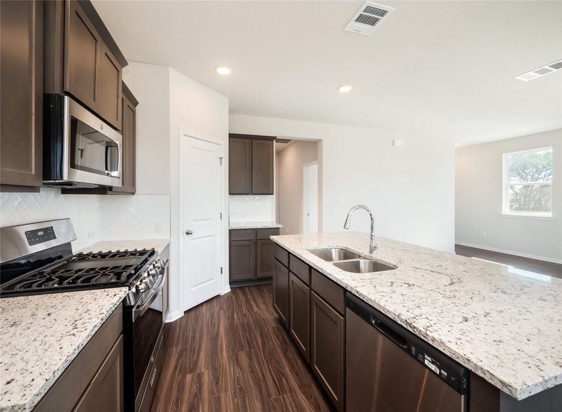Furnished interior view inside a new home in Anthem Cottages, Kyle (Image 6).