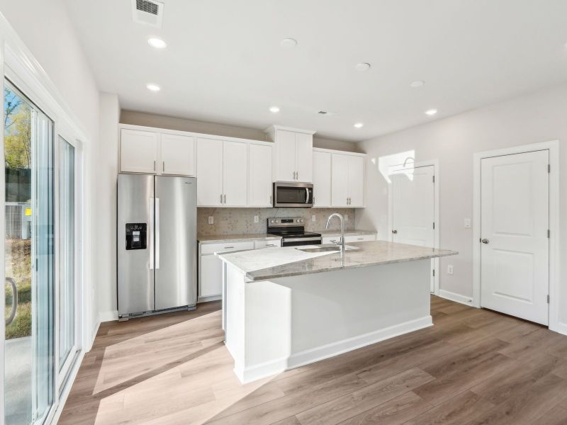 Furnished interior view inside a new home in Walnut Reserve, Conover (Image 6).