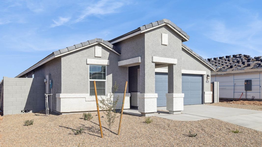 Representative exterior photo of a completed home built from the Gaven by D.R. Horton in Del Rio Ranch, Avondale, AZ (Image 21).