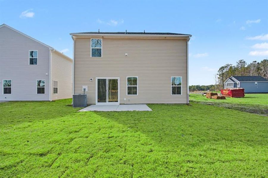 Exterior details and patio area of a home in Sterling Oaks, Ash (Image 2).