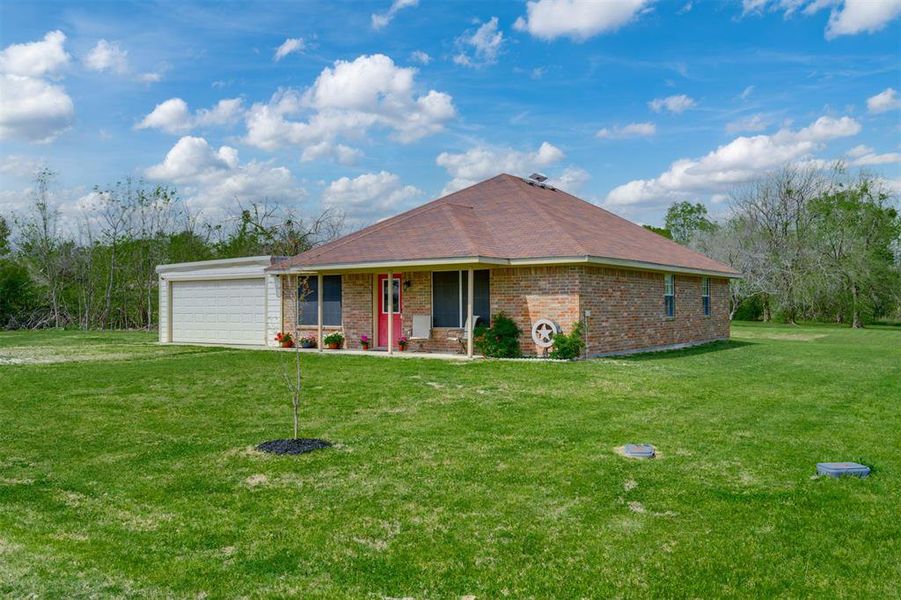 Exterior details and patio area of a home in , Powderly (Image 25).