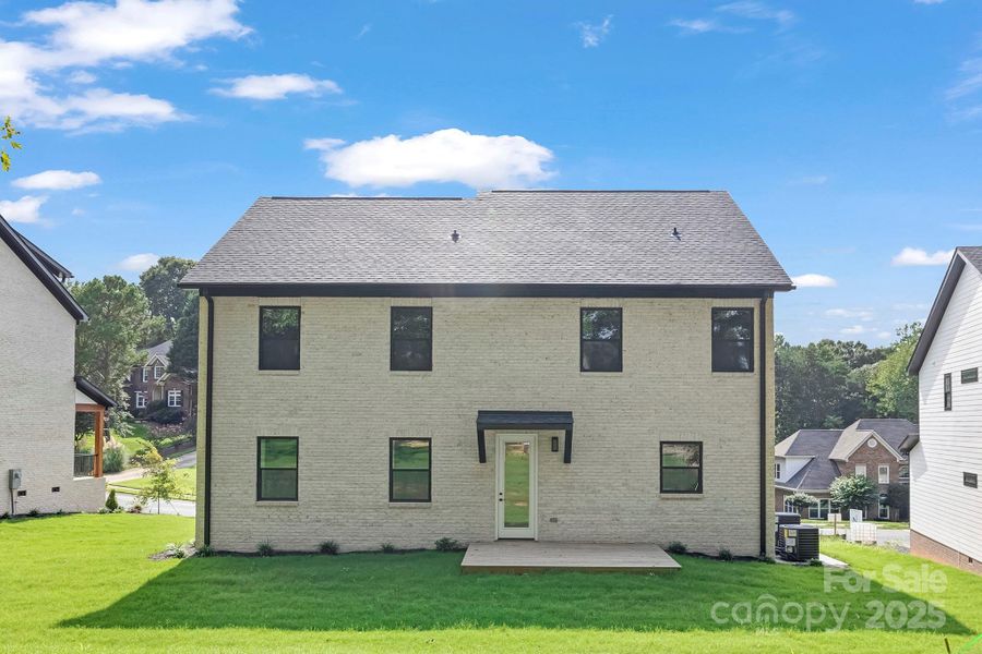 Front exterior of a new home in , Charlotte, NC, highlighting curb appeal (Image 23).