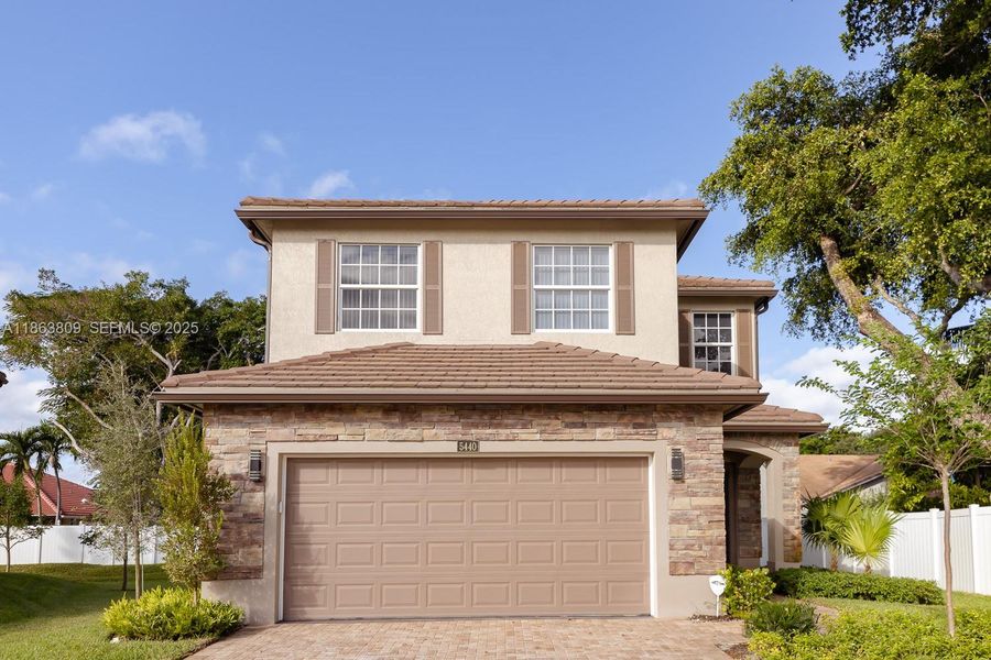 Front exterior of a new home in , Tamarac, FL, highlighting curb appeal (Image 29).