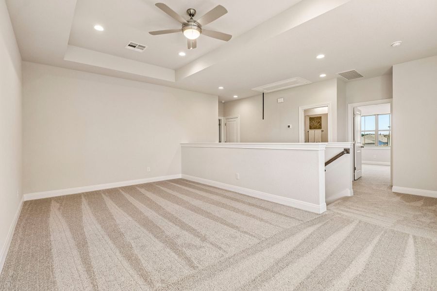 Representative unfurnished interior of a home built from the Hamilton by Risewell Homes in 6 Creeks, Kyle (Image 14).